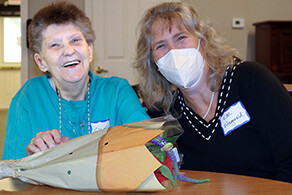 Resident Gisele Nelson (left) with CEO Kim Fitzgerald