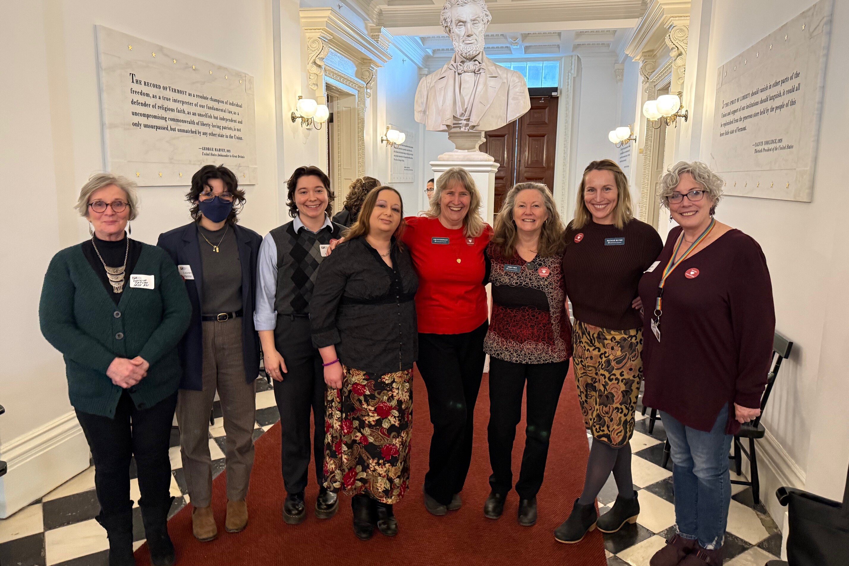 Several Cathedral Square staff members at the Vermont State House