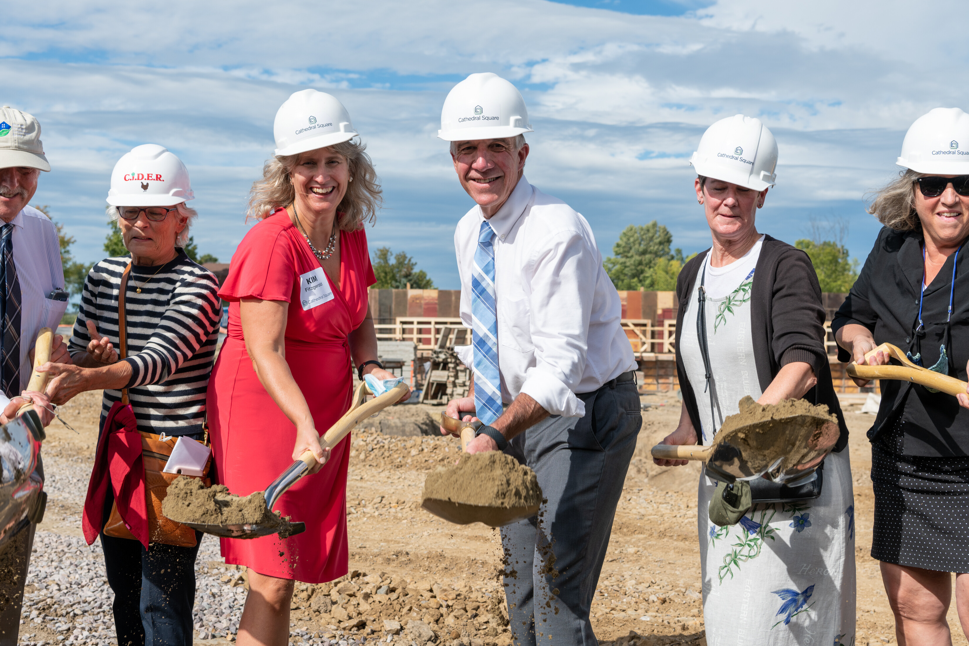 Governor Phil Scott and others throw a shovel of dirt at the groundbreaking ceremony.